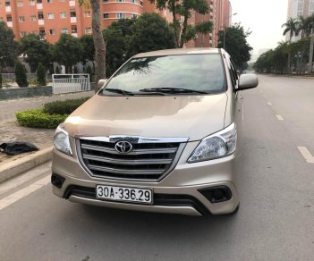 Toyota Innova 2014 - Cần bán lại xe Toyota Innova 2014, màu nâu số sàn, 365tr