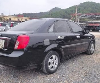 Daewoo Lacetti 2010 - Bán ô tô Daewoo Lacetti EX năm 2010, màu đen xe gia đình, 165 triệu