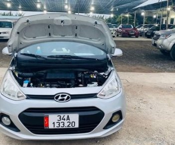 Hyundai Grand i10 2016 - Bán ô tô Hyundai Grand i10 năm 2016, màu bạc giá cạnh tranh