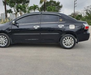 Toyota Vios 2011 - Cần bán lại xe Toyota Vios 1.5E năm sản xuất 2011, màu đen