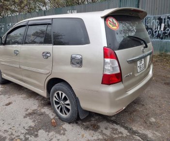 Toyota Innova 2012 - Cần bán lại xe Toyota Innova 2.0E sản xuất năm 2012, màu vàng 