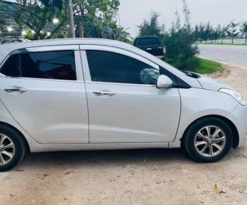 Hyundai Grand i10 2016 - Bán ô tô Hyundai Grand i10 năm 2016, màu bạc giá cạnh tranh