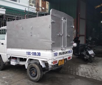 Suzuki Supper Carry Truck 2014 - Bán xe tải suzuki 5 tạ cũ thùng bạt đời 2014 màu trắng tại Hải Phòng lh 090.605.3322