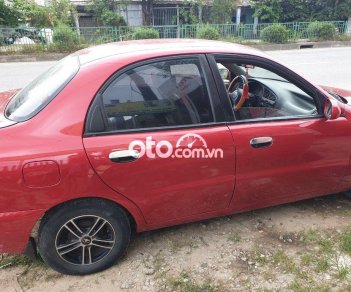 Daewoo Lanos 2003 - Cần bán lại xe Daewoo Lanos năm sản xuất 2003, màu đỏ, nhập khẩu