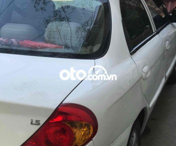 Kia Spectra 2004 - Bán xe Kia Spectra sản xuất 2004, màu trắng, nhập khẩu, giá 100tr