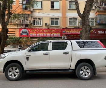 Toyota Hilux 2018 - Cần bán lại xe Toyota Hilux 2.4E năm 2018, màu trắng, xe nhập số tự động