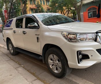 Toyota Hilux 2018 - Cần bán lại xe Toyota Hilux 2.4E năm 2018, màu trắng, xe nhập số tự động