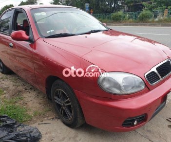 Daewoo Lanos 2003 - Cần bán lại xe Daewoo Lanos năm sản xuất 2003, màu đỏ, nhập khẩu