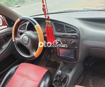 Daewoo Lanos 2003 - Cần bán lại xe Daewoo Lanos năm sản xuất 2003, màu đỏ, nhập khẩu