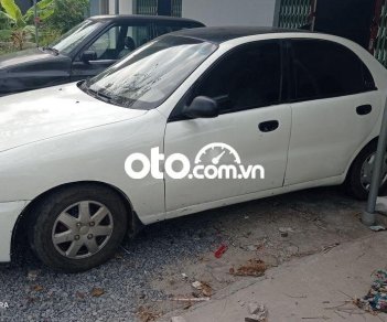 Daewoo Lanos 2003 - Cần bán Daewoo Lanos năm sản xuất 2003, màu trắng