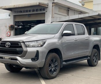 Toyota Hilux 2021 - Bán ô tô Toyota Hilux 2.4E AT năm 2021, màu bạc, nhập khẩu nguyên chiếc