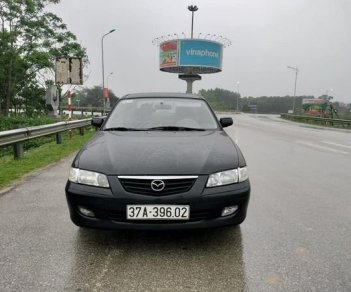Mazda 626 2003 - Xe màu đen