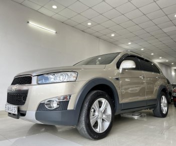 Chevrolet Captiva LTZ 2013 - Cần bán Chevrolet Captiva LTZ đời 2013, màu vàng, giá tốt