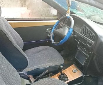 Mazda 323 2000 - Xe màu xanh