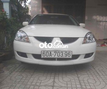 Mitsubishi Lancer 2004 - Màu trắng, xe nhập