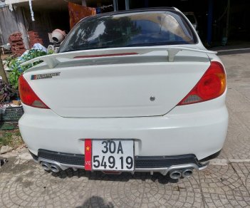 Kia Spectra 2004 - Xe màu trắng