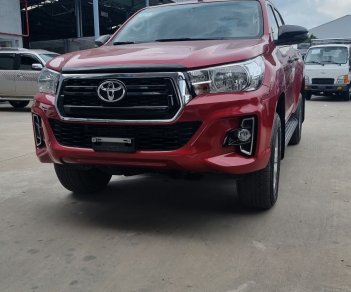 Toyota Hilux 2019 - Cần bán lại xe giá 690 triệu