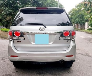 Toyota Fortuner AT 2015 - Tôi cần bán xe Fortuner 2015, số tự động, máy xăng, màu bạc còn mới tinh