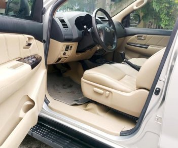 Toyota Fortuner AT 2015 - Tôi cần bán xe Fortuner 2015, số tự động, máy xăng, màu bạc còn mới tinh