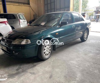 Ford Laser 2001 - Gầm máy bao chất