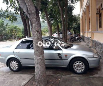 Ford Laser 2001 - Màu bạc, 125tr