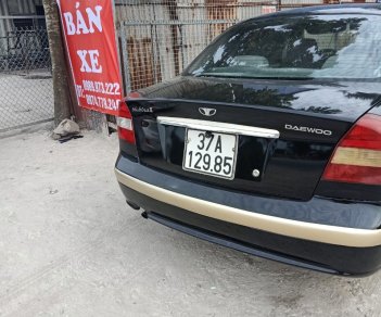 Daewoo Nubira 2003 - Xe màu đen, 60tr