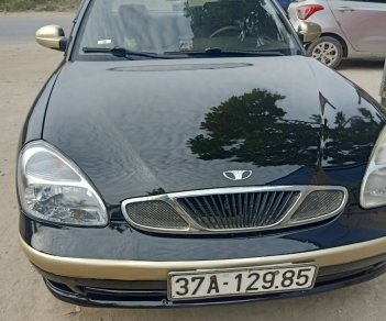 Daewoo Nubira 2003 - Xe màu đen, 60tr