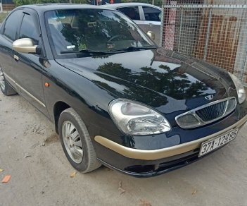 Daewoo Nubira 2003 - Xe màu đen, 60tr