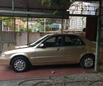 Ford Laser 2000 - Màu vàng