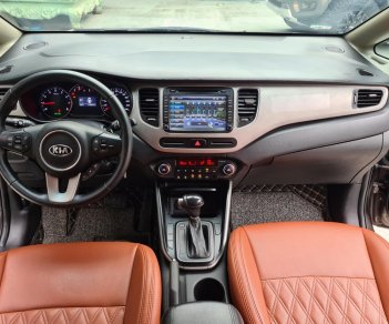 Kia Rondo 2015 - Số tự động, màu nâu, odo 77000km, biển TPHCM. Tặng 100% lệ phí trước bạ