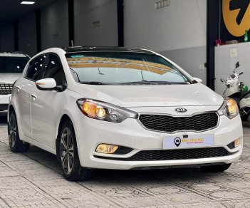 Kia Cerato 2.0 2013 - Kia Cerato Hatchback màu trắng  -- Sản xuất 2013 đăng ký 2014  