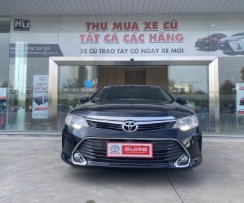 Toyota Camry 2016 - Màu đen, biển SG