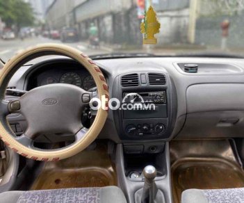 Ford Laser 2000 - Xe màu bạc, giá 135tr