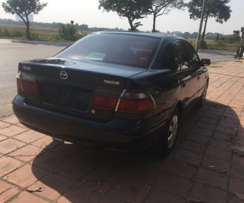 Mazda 626 1998 - Xe màu xanh đen