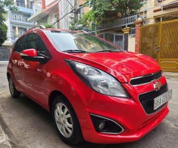 Chevrolet Spark 2014 - Cần bán xe auto, màu đỏ, gia đình sử dụng mới 95%