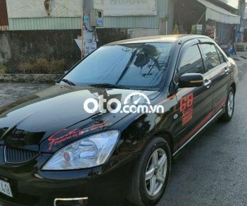 Mitsubishi Lancer Cần bán xe   máy cực êm 2004 - Cần bán xe Mitsubishi Lancer máy cực êm