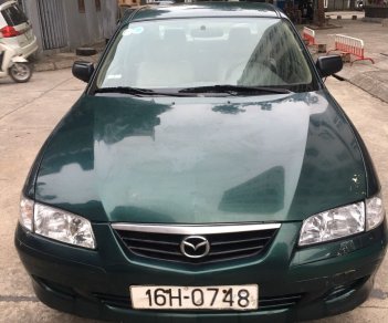 Mazda 626 2001 - Xe màu xanh lam 