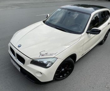 BMW X1 2011 - Màu trắng kem loại full đồ chơi nhà mua mới, một đời trùm mền ít đi xe vào rất nhiều đồ chơi