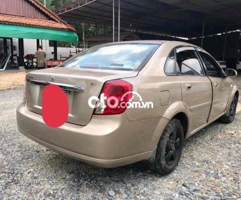 Daewoo Lacetti  2004 vàng cát máy bao êm 2004 - LACETTI 2004 vàng cát máy bao êm