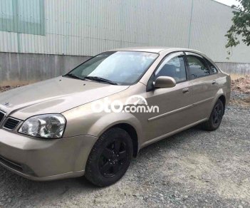 Daewoo Lacetti  2004 vàng cát máy bao êm 2004 - LACETTI 2004 vàng cát máy bao êm