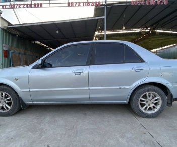 Ford Laser 2004 - Màu bạc, 145 triệu